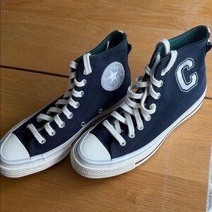 Converse Dark Blue High-Tops with White Accents